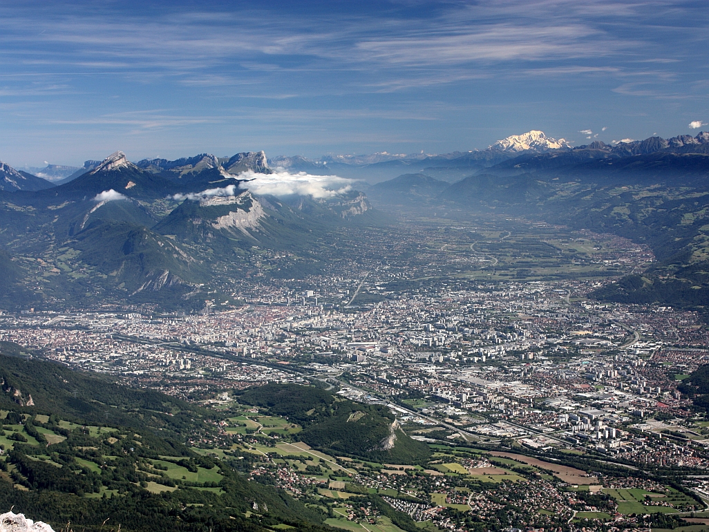 The city of Grenoble seen from Pic St. Michel in the Vercors Massif. Mont Blanc visible in the back. Photo of the city of Grenoble taken from Pic St Michel in the Vercors Massif, showing the Chartreuse Massif, the Grésivaudan valley and the Mont Blanc