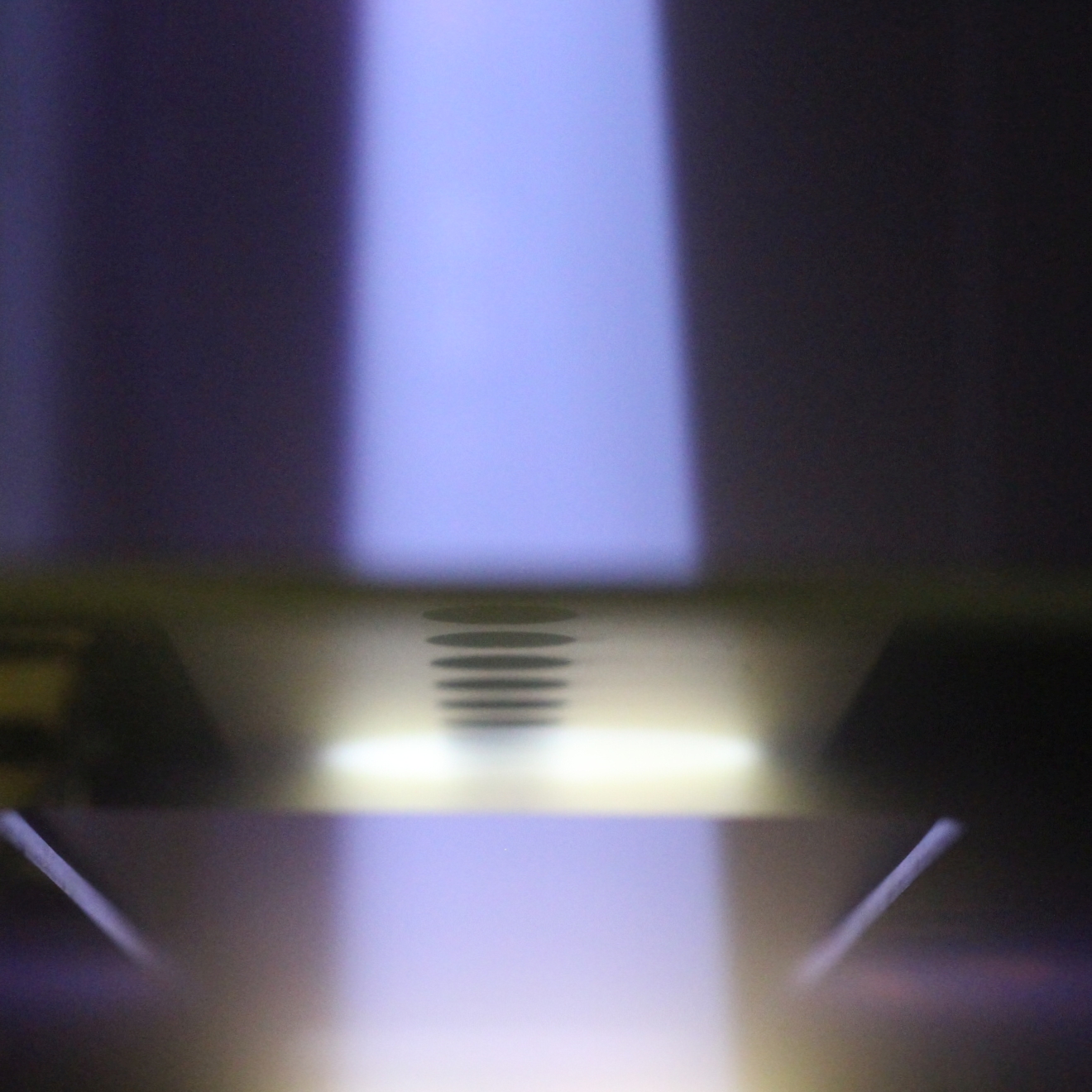 Linear ion beam (150x500 mm) seen from the 150 mm side Photo of linear ion beam of 150x500 mm, seen from the 150 mm side