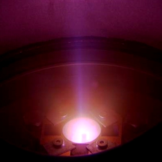 plasma mode for single cavity ECR source Photo of open ECR plasma cavity with plasma on