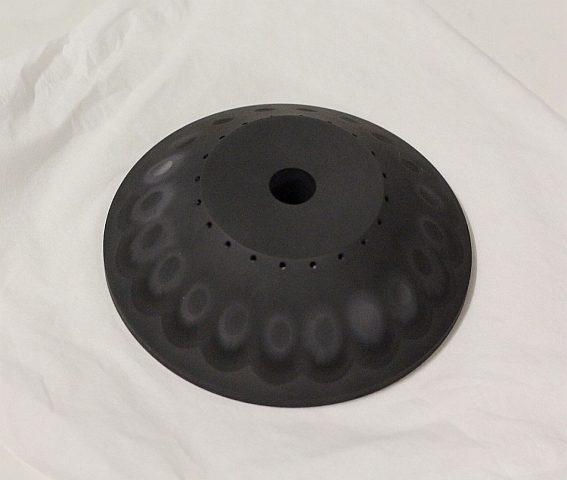 Monobloc target for multi beam sputter deposition on circular substrates Photo of conical target block typical for multi beam sputter deposition on circular substrates